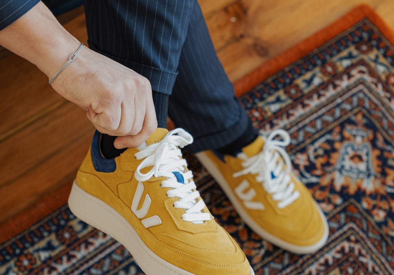 WAYZ Misfit Mustard Blue sneaker on carpet.