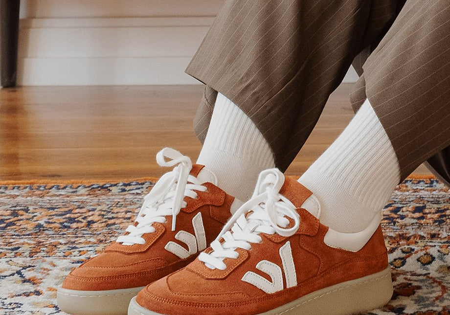 WAYZ Misfit Terracotta sneakers pairs on carpet.