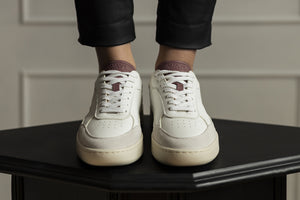 Person wearing our Hedonist Dry Rose Vegetable Tanned Leather Sneakers - Front view