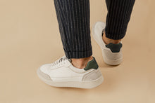 Load image into Gallery viewer, Person wearing our Hedonist White Grey Green Vegetable Tanned Leather Sneakers - Back view