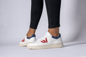 Person wearing our White Red Blue Veg-Tan Leather Misfit Sneakers - Side View | Wayz Sneakers