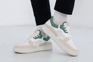People wearing our Sonder White Green Almond Milk Vegetable Tanned Leather Sneakers - Side view 2 | Wayz Sneakers